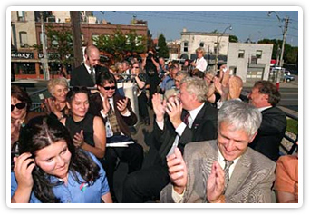 photo - West   Toronto Junction  Streetscape Grand Opening Mayor Miller, Councillors  Sylvia Watson and Bill Saundercook visit the West Toronto Junction community in  September 2004 with local  business owners, residents and West Toronto Junction team members to unveil the area&rsquo;s re-vitalized streetscape.